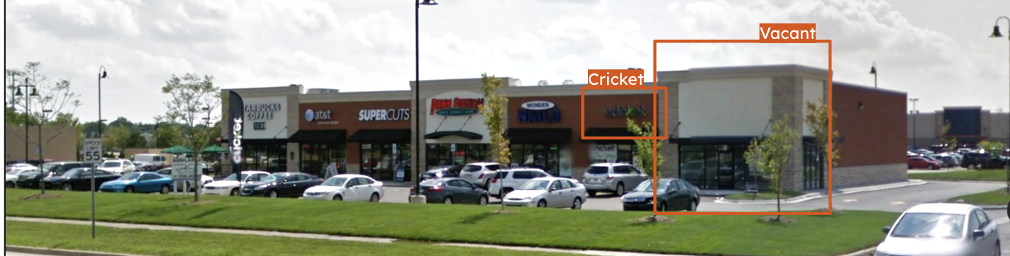 2015 street view of a Madison Heights strip mall: a storefront flagged Vacant by the text detection pipeline